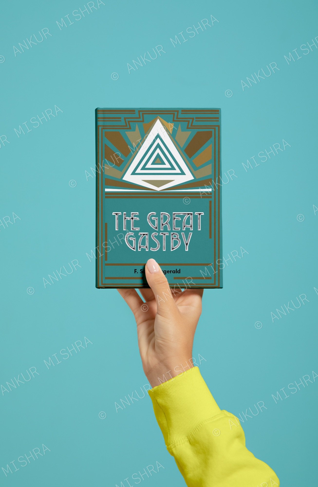 The Great Gatsby redesign held up against a teal background