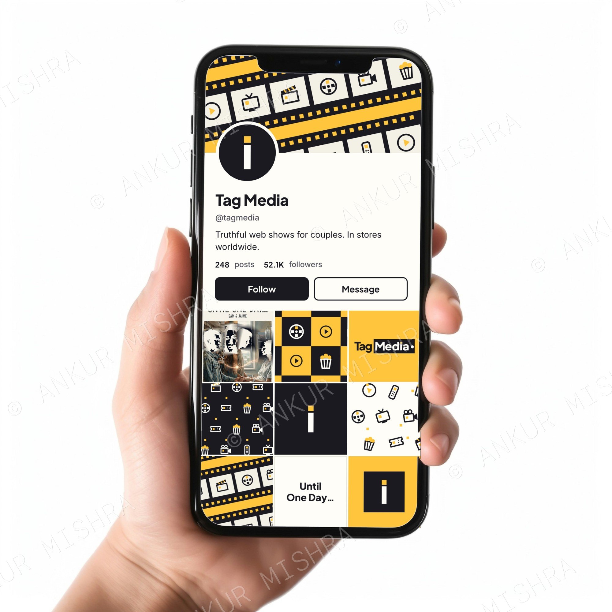Tag Media social profile on a phone held in a hand
